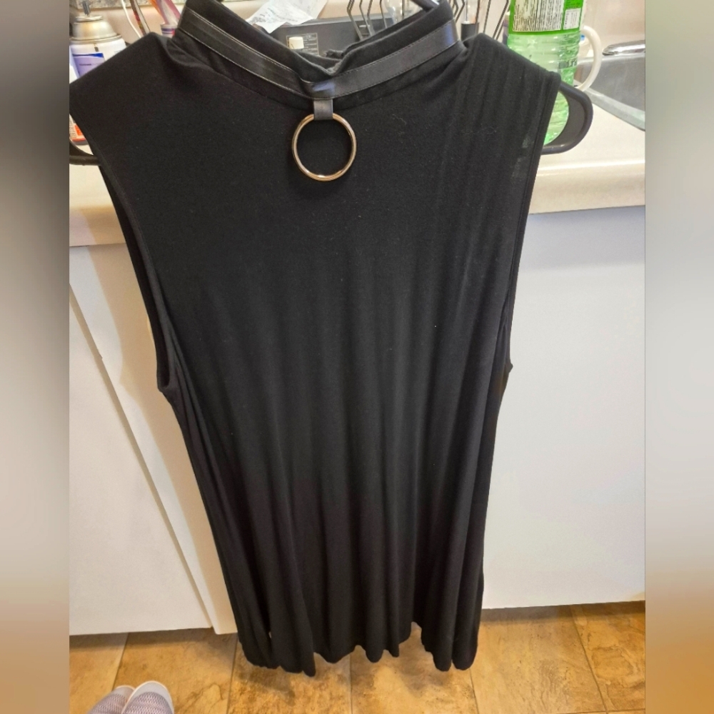 Elegant Black Sleeveless Dress with Ring Detail